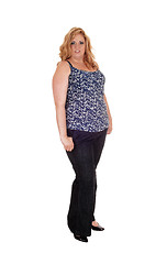 Image showing Plus size woman standing in jeans.