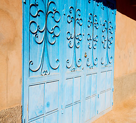 Image showing blue morocco old door and historical nail wood