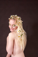 Image showing Happy Bare Woman with Flowers on her Blond Hair