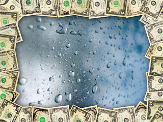 Image showing Frame from the dollars on the surface with drops