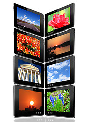 Image showing some black tablets with motley pictures