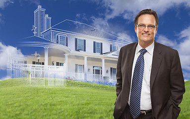 Image showing Smiling Businessman with Ghosted House Drawing Behind