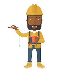 Image showing Afircan Electrician holding power cable plug