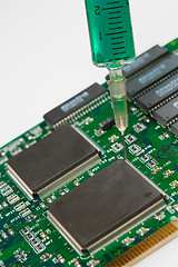 Image showing Glass syringe and circuit board