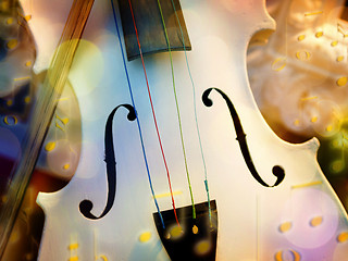 Image showing White violin with bokeh