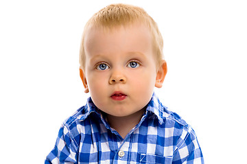 Image showing blue-eyed boy in a plaid shirt