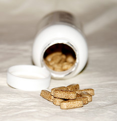 Image showing Pills outside the bottle