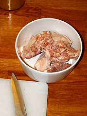 Image showing Preparing chicken for cooking