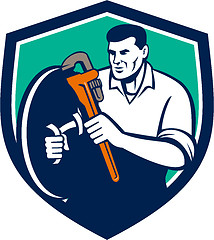 Image showing Plumber Brandishing Wrench Shield Retro