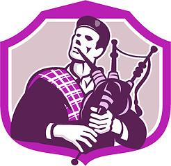 Image showing Scotsman Playing Bagpipes Shield Retro