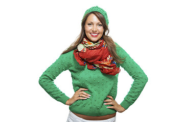 Image showing Cute sexy young woman in a green winter outfit