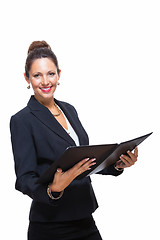 Image showing Smiling Pretty Businesswoman Holding a File Folder