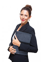 Image showing Smiling Pretty Businesswoman Holding a File Folder