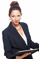 Image showing Smiling Pretty Businesswoman Holding a File Folder