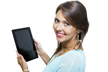 Image showing Pretty Woman Browsing at her Tablet Computer