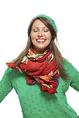 Image showing Cute sexy young woman in a green winter outfit