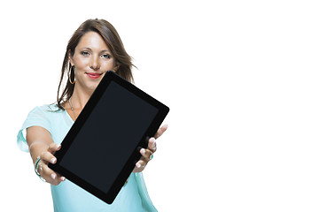 Image showing Pretty Woman Browsing at her Tablet Computer