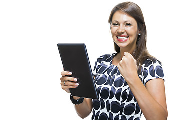 Image showing Smiling Woman in a Dress Holding a Tablet Computer