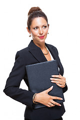 Image showing Smiling Pretty Businesswoman Holding a File Folder