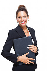 Image showing Smiling Pretty Businesswoman Holding a File Folder