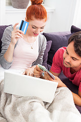 Image showing Young Couple Watching a Movie on Laptop Together