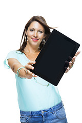 Image showing Pretty Woman Browsing at her Tablet Computer