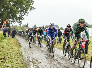 Image showing The Peloton on a Cobbled Road- Tour de France 2014