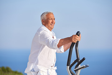 Image showing healthy senior man working out