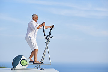 Image showing healthy senior man working out