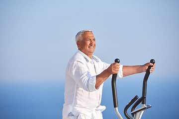 Image showing healthy senior man working out