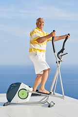 Image showing healthy senior man working out