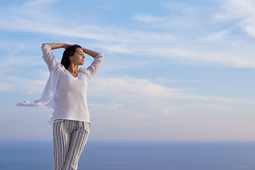 Image showing young woman enjoy sunset