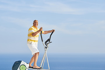 Image showing healthy senior man working out