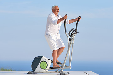 Image showing healthy senior man working out