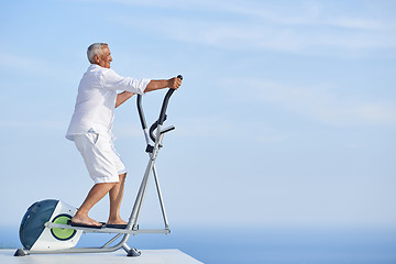 Image showing healthy senior man working out