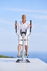 Image showing healthy senior man working out