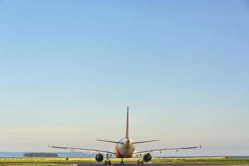 Image showing Commercial Plane Taxiing