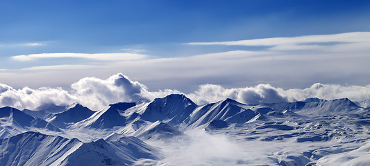 Image showing Panorama of snow plateau and sunlight sky in evening