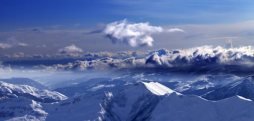 Image showing Panoramic view of mountains at evening and sunlight clouds