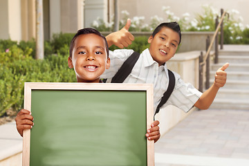 Image showing Boys with Thumbs Up Holding Blank Chalk Board on Campus