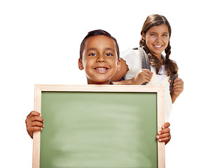 Image showing Hispanic Boy and Girl Holding Blank Chalk Board on White