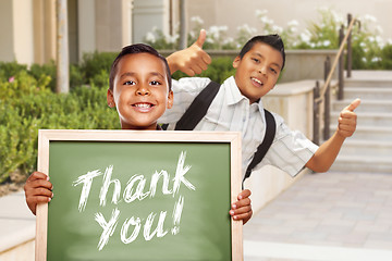 Image showing Boys Giving Thumbs Up Holding Thank You Chalk Board