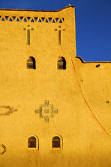 Image showing old brown construction in africa morocco and   near the tower