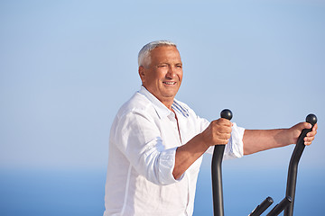Image showing healthy senior man working out