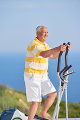 Image showing healthy senior man working out