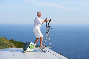 Image showing healthy senior man working out