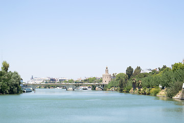 Image showing Gold tower from a ferry