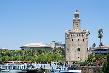 Image showing Ferrys in front of the Gold tower