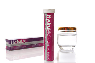 Image showing Box of hydralyte effervescent tablets and glass water