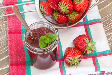 Image showing Preserving strawberry confiture